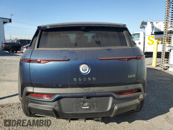 2023 Fisker Ocean One z VIN VCF1ZBU24PG003938, wystawiony jako Copart lot #89353135 z przebiegiem Nie podano mil oraz Szkody całkowita. Historia ofert i sprzedaży dostępna na DreamBid. Obrazek 6.