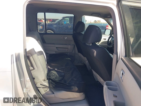 2013 Honda Pilot LX with VIN 5FNYF3H25DB014878, listed as a IAAI auction lot 42014613 with 169,292 mi miles and . Bid and sale history available at DreamBid. Image 8.