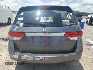 2014 Honda Odyssey EX-L with VIN 5FNRL5H62EB112280, listed as a Copart auction lot 60138645 with 167,657 mi miles and Salvage title. Bid and sale history available at DreamBid. Image 6.