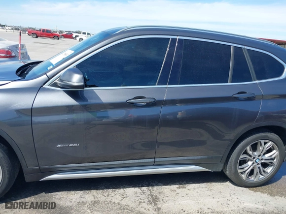 2017 BMW X1 xDrive28i with VIN WBXHT3Z33H4A65198, listed as a IAAI auction lot 41798503 with 88,951 mi miles. Bid and sale history available at carsss.com. Image 14.