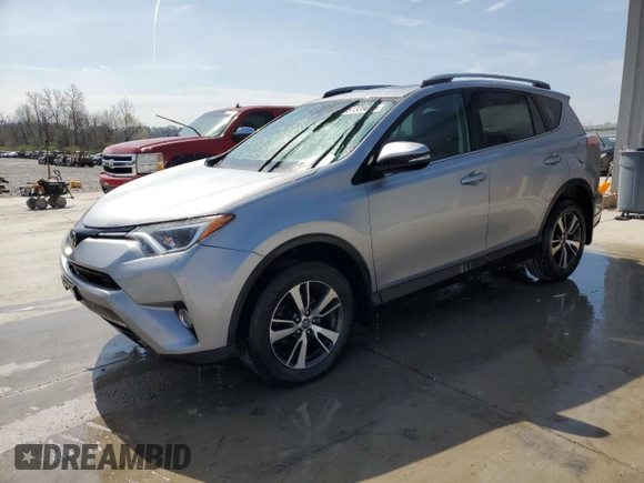 2018 Toyota RAV4 XLE with VIN 2T3RFREV3JW740122, listed as a Copart auction lot 51339045 with 115,293 mi miles and Salvage Title. Bid and sale history available at DreamBid. Image 1.