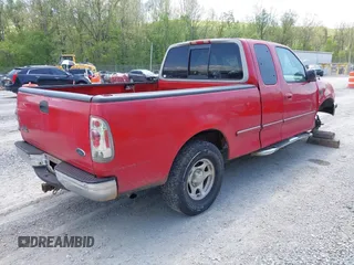 1998 Ford F-150 with VIN 1FTZX1768WNB10115, listed as a IAAI auction lot 42144769 with 294,775 mi miles and . Bid and sale history available at DreamBid. Image 4.