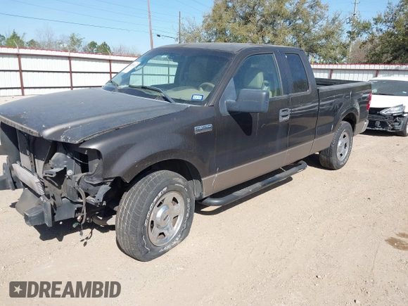 2005 Ford F-150 XLT with VIN 1FTPX12585NA67903, listed as a IAAI auction lot 41856821 with 174,847 mi miles. Bid and sale history available at carsss.com. Image 2.