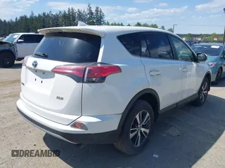 2018 Toyota RAV4 XLE with VIN JTMWFREV3JD130995, listed as a IAAI auction lot 42183630 with 56,624 mi miles. Bid and sale history available at carsss.com. Image 4.