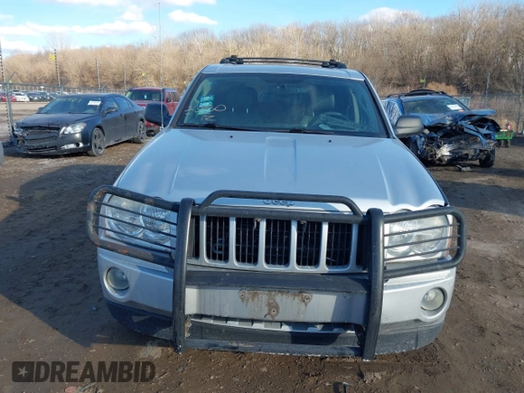 2005 Jeep Grand Cherokee Laredo z VIN 1J4GR48K85C587842, wystawiony jako IAAI lot #41454939 z przebiegiem 108 184 mil mil oraz . Historia ofert i sprzedaży dostępna na DreamBid. Obrazek 13.