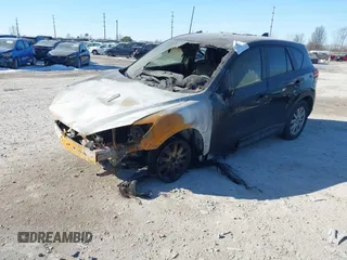 2015 Mazda CX-5 Sport z VIN JM3KE2BEXF0473564, wystawiony jako IAAI lot #41408107 z przebiegiem Nie podano mil oraz . Historia ofert i sprzedaży dostępna na DreamBid. Obrazek 2.