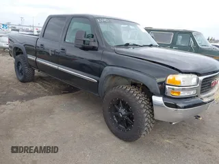 2001 GMC Sierra 1500HD SLT z VIN 1GTGK13U91F137210, wystawiony jako IAAI lot #41600294 z przebiegiem 156 589 mil mil oraz . Historia ofert i sprzedaży dostępna na DreamBid. Obrazek 1.