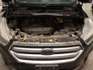 2017 Ford Escape SE with VIN 1FMCU9G94HUE08060, listed as a IAAI auction lot 41856229 with 187,838 mi miles and . Bid and sale history available at carsss.com. Image 10.
