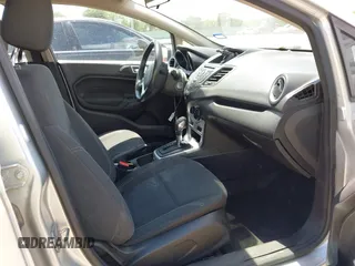 2016 Ford Fiesta SE with VIN 3FADP4BJ4GM101162, listed as a IAAI auction lot 42240414 with 216,099 mi miles and . Bid and sale history available at DreamBid. Image 5.