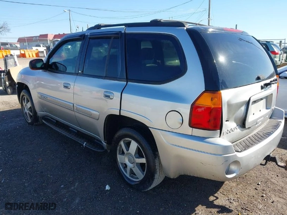 2004 GMC Envoy SLE with VIN 1GKDT13S042337388, listed as a IAAI auction lot 41756816 with 309,789 mi miles. Bid and sale history available at carsss.com. Image 3.