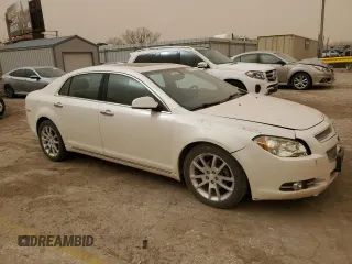 2012 Chevrolet Malibu LTZ with VIN 1G1ZG5E74CF315920, listed as a Copart auction lot 48864385 with 163,221 mi miles and Salvage Title. Bid and sale history available at DreamBid. Image 4.