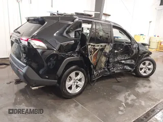 2019 Toyota RAV4 XLE with VIN 2T3P1RFV1KW052156, listed as a IAAI auction lot 41974041 with 95,442 mi miles. Bid and sale history available at carsss.com. Image 4.