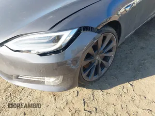 2019 Tesla Model S 75D with VIN 5YJSA1E2XKF331744, listed as a IAAI auction lot 41483173 with Not provided miles and . Bid and sale history available at DreamBid. Image 6.