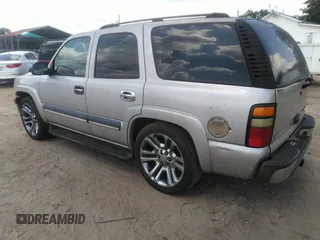 2004 Chevrolet Tahoe LT with VIN 1GNEC13ZX4R203631, listed as a IAAI auction lot 42797033 with Not provided miles and . Bid and sale history available at DreamBid. Image 3.