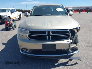 2014 Dodge Durango SXT with VIN 1C4RDJAG0EC455787, listed as a IAAI auction lot 42651627 with 103,218 mi miles and . Bid and sale history available at DreamBid. Image 12.