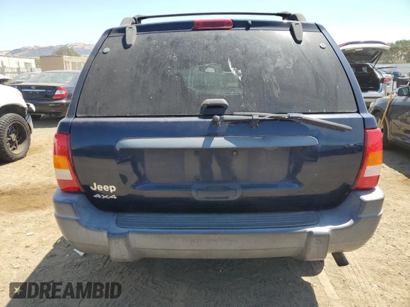 2004 Jeep Grand Cherokee Laredo with VIN 1J4GW48S34C343281, listed as a Copart auction lot 63253325 with 247,697 mi miles and Clean title. Bid and sale history available at DreamBid. Image 6.
