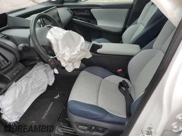 2023 Subaru Solterra Touring with VIN JTMABABA4PA003434, listed as a Copart auction lot 59837165 with 9,587 mi miles and Salvage title. Bid and sale history available at DreamBid. Image 7.
