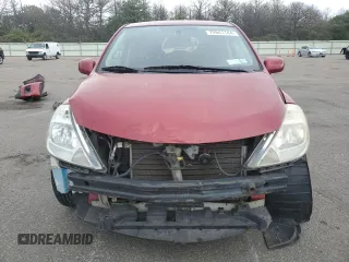 2010 Nissan Versa 1.8 S with VIN 3N1BC1AP4AL371722, listed as a Copart auction lot 72641144 with 128,445 mi miles and Salvage Title. Bid and sale history available at carsss.com. Image 5.