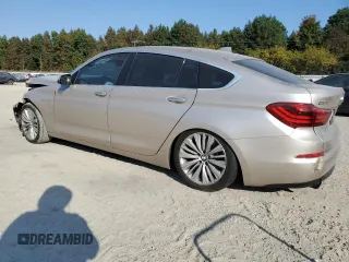 2014 BMW 5 Series GT 535i with VIN WBA5M2C55ED085766, listed as a Copart auction lot 76716934 with 151,144 mi miles and Salvage Title. Bid and sale history available at carsss.com. Image 3.