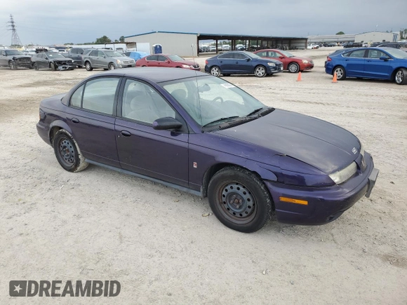 1996 Saturn SL with VIN 1G8ZK5278TZ255742, listed as a Copart auction lot 79050024 with 83,205 mi miles and Salvage title. Bid and sale history available at DreamBid. Image 4.