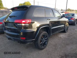 2017 Jeep Grand Cherokee Altitude with VIN 1C4RJEAG3HC854343, listed as a IAAI auction lot 42519303 with 136,721 mi miles and . Bid and sale history available at DreamBid. Image 4.