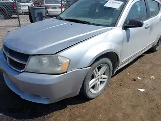 2008 Dodge Avenger SXT with VIN 1B3LC56K28N684317, listed as a IAAI auction lot 41988986 with 241,325 mi miles and . Bid and sale history available at DreamBid. Image 6.