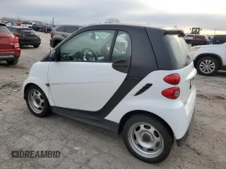 2014 Smart fortwo Pure z VIN WMEEJ3BA0EK757231, wystawiony jako Copart lot #52346105 z przebiegiem 142 976 mil mil oraz Czysty tytuł • Clean title. Historia ofert i sprzedaży dostępna na DreamBid. Obrazek 2.