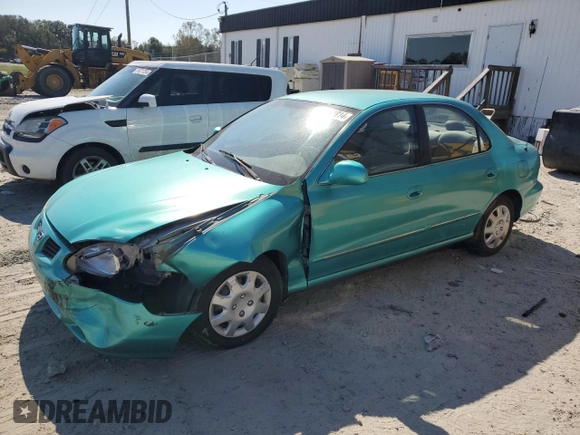 2000 Hyundai Elantra GLS z VIN KMHJF35FXYU998689, wystawiony jako Copart lot #76181814 z przebiegiem 154 743 mil mil oraz Szkoda całkowita • Salvage title. Historia ofert i sprzedaży dostępna na DreamBid. Obrazek 1.