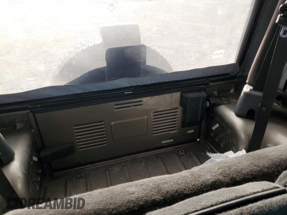 2003 Jeep Wrangler X с VIN 1J4FA39S03P349713, выставлен на аукционе Copart как лот 55768995 с пробегом 187 266 миль миль и Списание • Salvage title. История ставок и продаж доступна на DreamBid. Изображение 10.