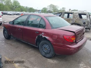 2001 Saturn SL z VIN 1G8ZH528X1Z355295, wystawiony jako IAAI lot #42057484 z przebiegiem 202 555 mil mil oraz . Historia ofert i sprzedaży dostępna na DreamBid. Obrazek 3.