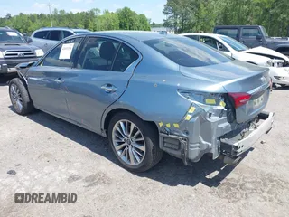 2020 Infiniti Q50 Luxe z VIN JN1EV7AP9LM207501, wystawiony jako IAAI lot #42033154 z przebiegiem 98 670 mil mil oraz . Historia ofert i sprzedaży dostępna na DreamBid. Obrazek 3.