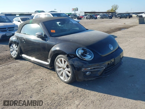 2014 Volkswagen Beetle 1.8T with VIN 3VW517AT4EM815243, listed as a IAAI auction lot 41245346 with 119,259 mi miles and . Bid and sale history available at DreamBid. Image 1.