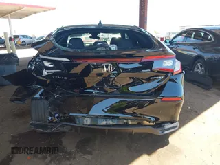 2025 Honda Civic Sport z VIN 19XFL2H89SE018384, wystawiony jako IAAI lot #42007336 z przebiegiem 3 782 mil mil oraz . Historia ofert i sprzedaży dostępna na DreamBid. Obrazek 16.