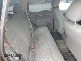 2007 Jeep Grand Cherokee Laredo z VIN 1J8GR48K47C681735, wystawiony jako Copart lot #59006435 z przebiegiem 195 517 mil mil oraz Nie do naprawy • Non repairable. Historia ofert i sprzedaży dostępna na DreamBid. Obrazek 11.