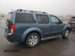2005 Nissan Pathfinder SE z VIN 5N1AR18W65C705332, wystawiony jako Copart lot #86779704 z przebiegiem 119 877 mil mil oraz Czysty tytuł • Clean title. Historia ofert i sprzedaży dostępna na DreamBid. Obrazek 3.