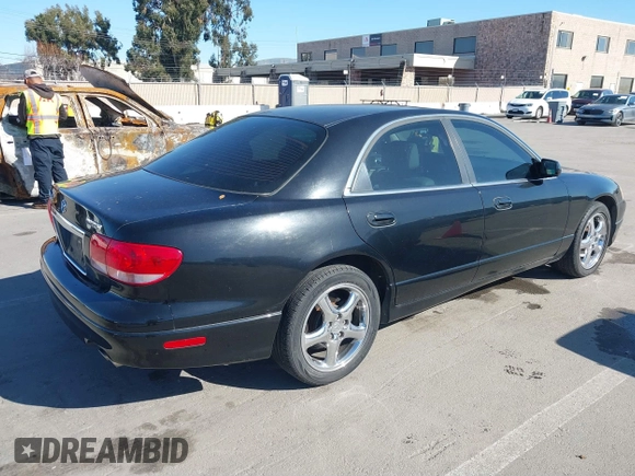 2002 Mazda Millenia S z VIN JM1TA222421728535, wystawiony jako IAAI lot #41525259 z przebiegiem 131 870 mil mil oraz . Historia ofert i sprzedaży dostępna na DreamBid. Obrazek 4.