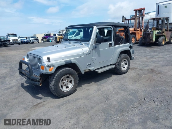 2004 Jeep Wrangler Sport with VIN 1J4FA49S04P781581, listed as a IAAI auction lot 42078693 with 111,123 mi miles and . Bid and sale history available at DreamBid. Image 2.