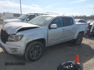 2019 Chevrolet Colorado 2WD Work Truck with VIN 1GCGSBEA7K1199177, listed as a IAAI auction lot 41622091 with 105,231 mi miles and . Bid and sale history available at DreamBid. Image 2.