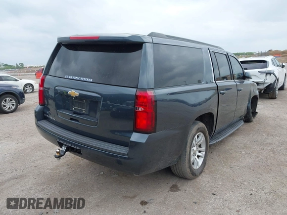 2020 Chevrolet Suburban LT z VIN 1GNSKHKC2LR259315, wystawiony jako IAAI lot #42129791 z przebiegiem 72 979 mil mil oraz . Historia ofert i sprzedaży dostępna na DreamBid. Obrazek 4.
