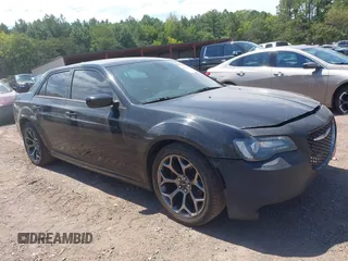 2015 Chrysler 300 with VIN 2C3CCABG1FH807740, listed as a IAAI auction lot 40246268 with 174,037 mi miles. Bid and sale history available at carsss.com. Image 1.