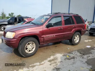 1999 Jeep Grand Cherokee Limited с VIN 1J4GW68N2XC596991, выставлен на аукционе Copart как лот 59549265 с пробегом 203 279 миль миль и На запчасти • Non repairable. История ставок и продаж доступна на DreamBid. Изображение 1.
