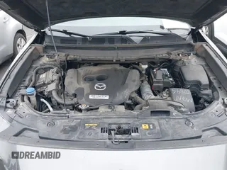 2018 Mazda CX-9 Grand Touring with VIN JM3TCBDY1J0200183, listed as a IAAI auction lot 42408132 with 69,023 mi miles and . Bid and sale history available at DreamBid. Image 10.