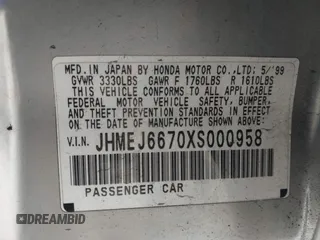 1999 Honda Civic LX with VIN JHMEJ6670XS000958, listed as a IAAI auction lot 41620949 with 93,698 mi miles and . Bid and sale history available at DreamBid. Image 9.