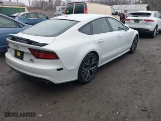 2017 Audi A7 Premium Plus with VIN WAUW2AFC0HN085266, listed as a IAAI auction lot 41461035 with 135,459 mi miles. Bid and sale history available at carsss.com. Image 4.