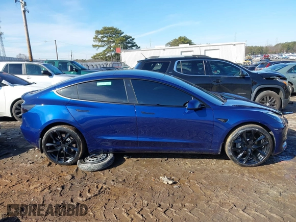 2023 Tesla Model 3 Long Range with VIN 5YJ3E1EB0PF688172, listed as a IAAI auction lot 41411580 with 21,125 mi miles and . Bid and sale history available at DreamBid. Image 13.
