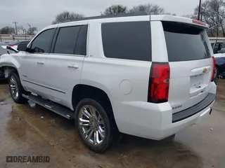 2018 Chevrolet Tahoe LT with VIN 1GNSCBKC5JR323595, listed as a IAAI auction lot 41550552 with 115,697 mi miles. Bid and sale history available at carsss.com. Image 3.