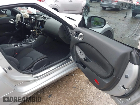 2010 Nissan 370Z Touring with VIN JN1AZ4EH9AM503264, listed as a IAAI auction lot 42180901 with Not provided miles and . Bid and sale history available at DreamBid. Image 5.