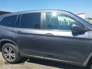 2017 Honda Pilot EX-L with VIN 5FNYF6H59HB032480, listed as a IAAI auction lot 42488789 with 112,595 mi miles and . Bid and sale history available at DreamBid. Image 13.