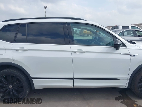 2021 Volkswagen Tiguan SE with VIN 3VV3B7AX9MM003432, listed as a IAAI auction lot 41914477 with 64,530 mi miles and . Bid and sale history available at DreamBid. Image 14.