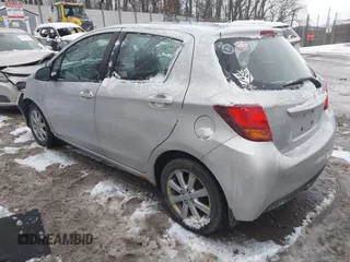 2015 Toyota Yaris L with VIN VNKKTUD32FA017551, listed as a IAAI auction lot 41267892 with 122,506 mi miles. Bid and sale history available at carsss.com. Image 3.